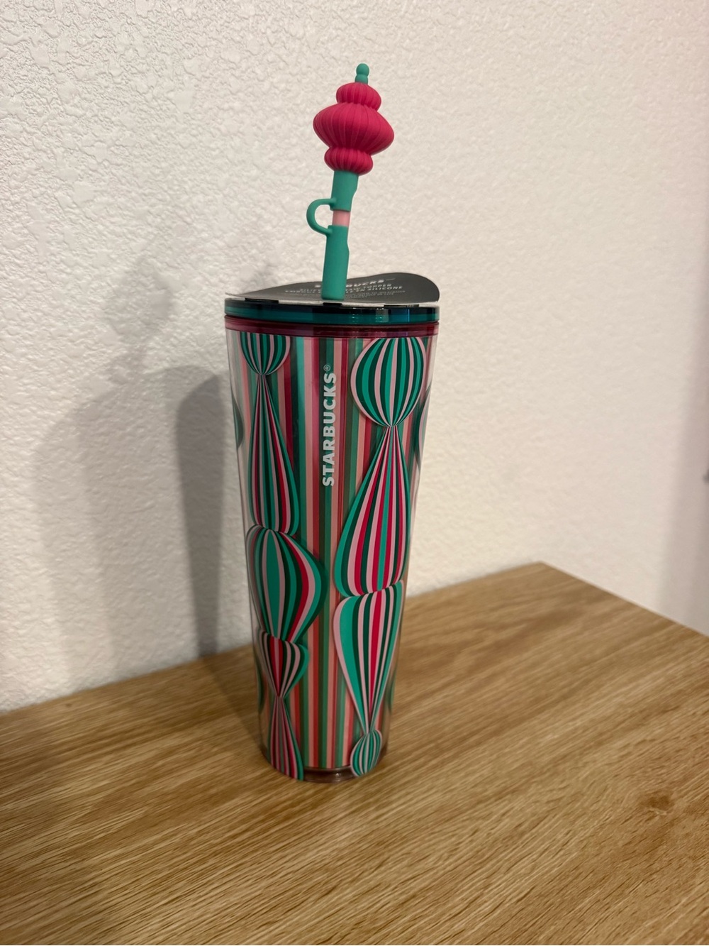 Starbucks holiday 2024 pink green tumbler with straw and topper